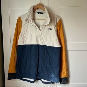 The North Face Cream and Yellow Jacket